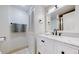 Clean bathroom with a white vanity, marble countertop, and walk-in shower at 1777 Larimer St # 1608, Denver, CO 80202