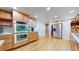 Modern kitchen featuring stainless steel appliances and wood cabinetry at 1777 Larimer St # 1608, Denver, CO 80202