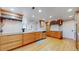 Well-equipped kitchen with wood cabinets and stainless steel appliances at 1777 Larimer St # 1608, Denver, CO 80202