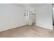 Bright bedroom features neutral carpet, a window, and closet for a serene and comfortable space at 4400 S Quebec St # 105K, Denver, CO 80237