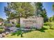 Community sign at Brandy Chase features manicured landscaping and attractive signage at 4400 S Quebec St # 105K, Denver, CO 80237