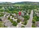 Charming neighborhood with lush green landscaping and mountain views in a peaceful setting at 18 Blue Sage, Littleton, CO 80127