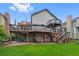Spacious backyard features a multi-level deck for outdoor entertaining and relaxing in a serene setting at 18 Blue Sage, Littleton, CO 80127