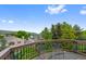 Outdoor balcony with chairs and scenic views of the neighborhood at 18 Blue Sage, Littleton, CO 80127