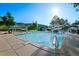 Enjoy a large, inviting pool and recreation area with a slide on a sunny day at 18 Blue Sage, Littleton, CO 80127