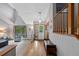 Bright foyer with hardwood floors, high ceilings, and natural light from large windows at 18 Blue Sage, Littleton, CO 80127