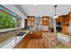 Beautiful kitchen with granite countertops, stainless appliances, and large window for natural light at 18 Blue Sage, Littleton, CO 80127