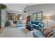 Spacious living area with open floor plan and ample room for entertaining at 18 Blue Sage, Littleton, CO 80127