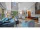 Comfortable living room with lots of natural light and hardwood floors at 18 Blue Sage, Littleton, CO 80127
