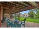 Outdoor patio features comfortable seating and offers a relaxing spot to enjoy the backyard and nature at 18 Blue Sage, Littleton, CO 80127
