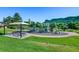 Community playground with slides and picnic area for families and children at 18 Blue Sage, Littleton, CO 80127