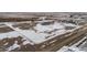 Aerial view showing a house and expansive property in a rural setting at 4220 Headlight Rd, Strasburg, CO 80136