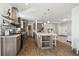 Modern kitchen with stainless steel appliances and an island at 4220 Headlight Rd, Strasburg, CO 80136