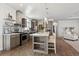 Modern kitchen with stainless steel appliances and an island at 4220 Headlight Rd, Strasburg, CO 80136