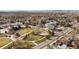 Aerial view of a neighborhood with a park and new construction homes at 5193 Carr St, Arvada, CO 80002