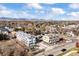 Aerial view of new construction homes and mountain views at 5193 Carr St, Arvada, CO 80002