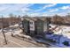 Modern townhome under construction with green exterior siding at 5193 Carr St, Arvada, CO 80002