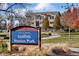 Griffith Station Park entrance with autumn trees and new homes in background at 5193 Carr St, Arvada, CO 80002