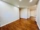 Bright living room featuring gleaming hardwood floors and neutral paint at 2027 S Newton St, Denver, CO 80219