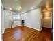 Cozy living room with gleaming hardwood floors and abundant natural light at 2027 S Newton St, Denver, CO 80219