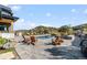 Stunning outdoor pool area with comfortable seating and views of the surrounding landscape at 7868 Cicero Ct, Littleton, CO 80125
