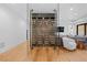Elegant wine cellar featuring glass doors and custom racking for showcasing your collection at 7868 Cicero Ct, Littleton, CO 80125