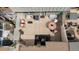 Aerial view showcasing the patio with outdoor seating and landscaping within a fenced backyard at 7355 S Knolls Way, Centennial, CO 80122