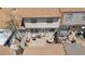 Aerial view of a cozy backyard patio area, perfect for outdoor entertaining and relaxing at 7355 S Knolls Way, Centennial, CO 80122