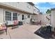 Enclosed patio area with seating and decorative features, offering a private outdoor retreat at 7355 S Knolls Way, Centennial, CO 80122
