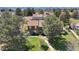 A well-kept home facade with green lawn and mature trees, enhancing curb appeal at 7355 S Knolls Way, Centennial, CO 80122