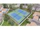 Aerial view of well-maintained tennis courts in a lovely community setting at 7355 S Knolls Way, Centennial, CO 80122
