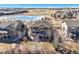 Expansive backyard featuring multi-level deck overlooking green common area, perfect for entertaining at 7680 S Blackstone Pkwy, Aurora, CO 80016