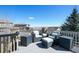 Outdoor deck featuring comfortable seating, perfect for enjoying beautiful views at 7680 S Blackstone Pkwy, Aurora, CO 80016