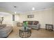Inviting living room area with stylish furniture and a modern aesthetic at 7680 S Blackstone Pkwy, Aurora, CO 80016