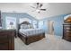 Spacious main bedroom with vaulted ceiling, carpet, and ensuite bathroom at 7680 S Blackstone Pkwy, Aurora, CO 80016