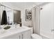Bright bathroom featuring a single sink vanity at 1836 Grove St # 108, Denver, CO 80204