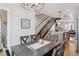 Cozy dining room with seating for six under a chandelier, conveniently off the kitchen at 1836 Grove St # 108, Denver, CO 80204