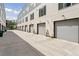 Row of garage doors offer convenient and secure parking at 1836 Grove St # 108, Denver, CO 80204