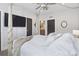 Bright main bedroom featuring a bed and closet at 1836 Grove St # 108, Denver, CO 80204