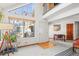 Bright living room with fireplace and vaulted ceilings at 5922 Gunbarrel Ave # E, Boulder, CO 80301