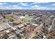 Aerial view of property within a city neighborhood with a view of the cityscape in the background at 1850 S Williams St, Denver, CO 80210