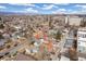 Quaint homes sit on tree-lined streets in a quiet neighborhood with easy access to urban amenities and transportation routes at 1850 S Williams St, Denver, CO 80210