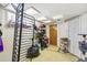 Basement area with access to a window, overhead lighting, and closet space at 1850 S Williams St, Denver, CO 80210