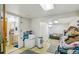 Bright basement featuring a bathroom, window, and access to other areas of the house at 1850 S Williams St, Denver, CO 80210