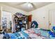 Bedroom with natural light, wooden floors, and closet space at 1850 S Williams St, Denver, CO 80210