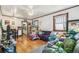 Cozy living room with hardwood floors, vintage details, and comfortable furniture at 1850 S Williams St, Denver, CO 80210