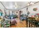 Inviting living room features hardwood floors, natural light, and comfortable seating at 1850 S Williams St, Denver, CO 80210