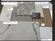 A collection of flooring, backsplash, wall, and countertop samples showcases the variety of design options available at 22 Waterford St, Erie, CO 80516