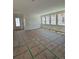 Bright living room with lots of windows and plenty of space for furniture at 22 Waterford St, Erie, CO 80516