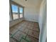 Sunlit office space featuring three large windows offers an ideal work-from-home environment at 22 Waterford St, Erie, CO 80516